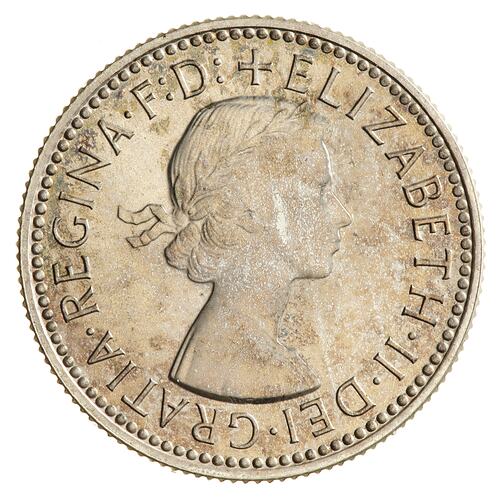 Round silver coin.