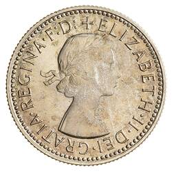 Round silver coin.