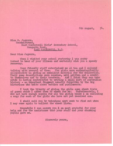 Typed letter in black ink on pink paper.