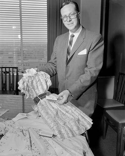 Imperial Chemical Industries, Man Showing a Dress, Melbourne, 07 Mar 1960