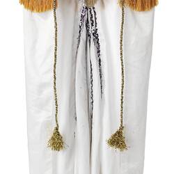 White costume cloak with gold and coloured detailed top section.