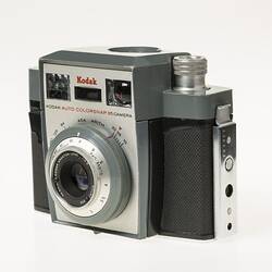 Black, grey and silver, metal and plastic 35mm camera.