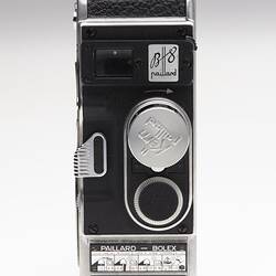 Front of small black plastic camera.