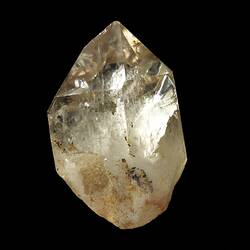 Pointed crystal, clear at top, cloudy at base.