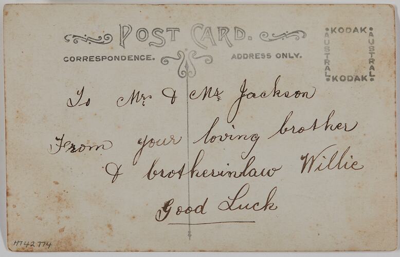 Back of postcard with handwriting.