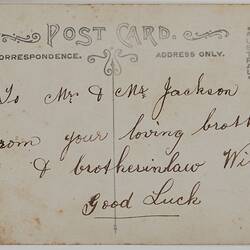 Back of postcard with handwriting.