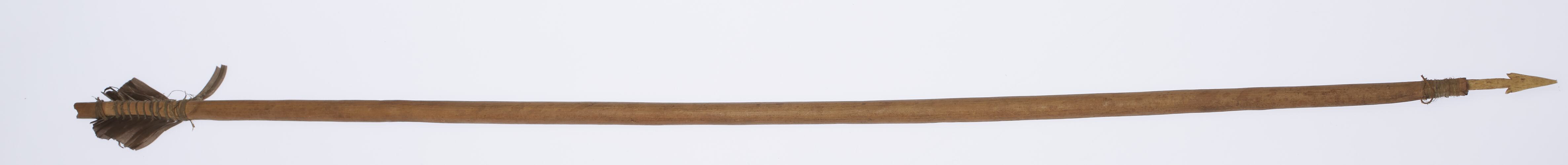 Model arrow, part of a set which includes a model bow and another model arrow. Made by Gushamginiyiy in 1908.