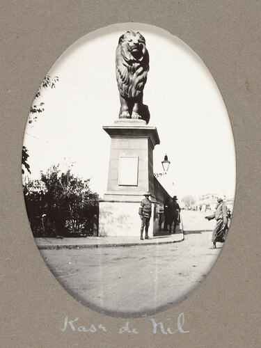 Lion statue at entrance to bridge.
