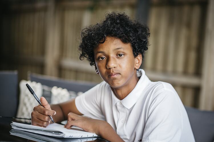 Kofi Aden Writing His Gratitude Journal During COVID-19, Roxburgh Park, Victoria, 25 November 2020