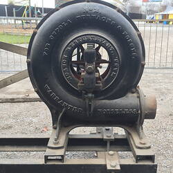 Close up of fan mounted on trolley frame.