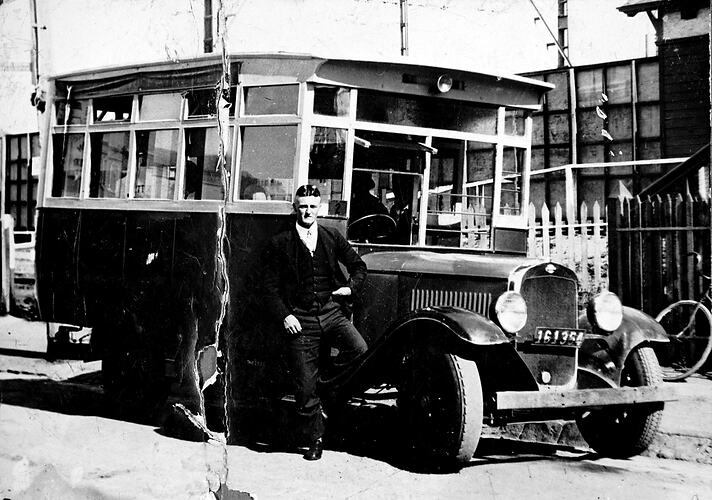 Driver posing with bus, Fairfield, 1926.