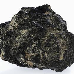 Lumpy black rock.