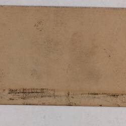 Retangular brown card.