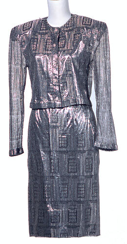 Silver women's suit on mannequin.