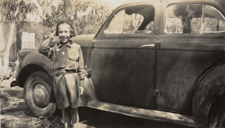 Digital Photograph - Girl Saluting in her Brownie Uniform, by Willys Overland Car, Montmorency, circa 1950