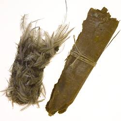 Paper bark & emu feather sheaths for stone knife