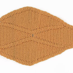 Assymetrical knitted light brown sampler.