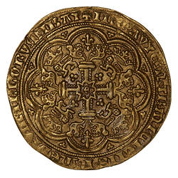 Coin, round, at centre, the letter E (King's initial) above a floriated cross. Lion passant below a crown.