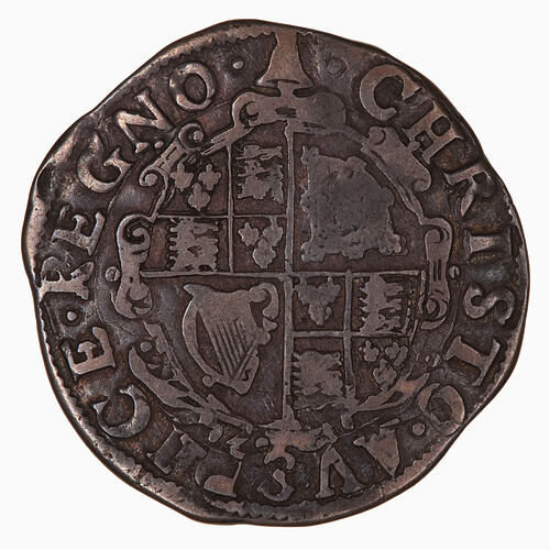 Coin, round, at centre shield quartered with the arms of England, France, Scotland and Ireland.
