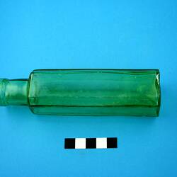 Green glass bottle.