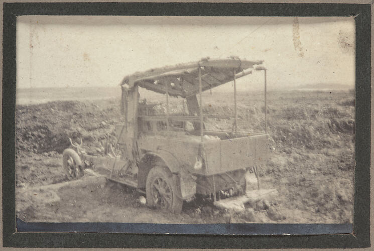 Destroyed shell of a truck.