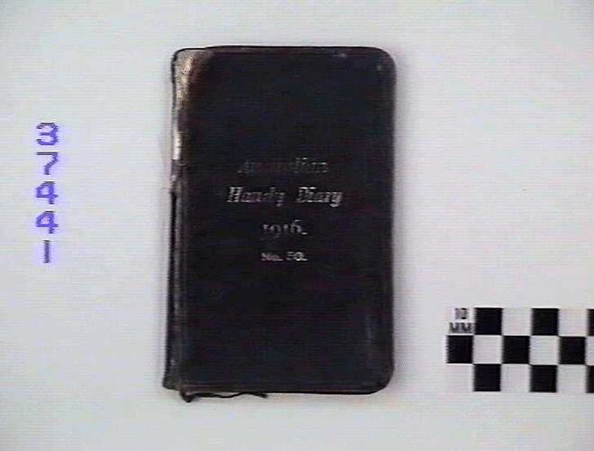 Black book with white text.