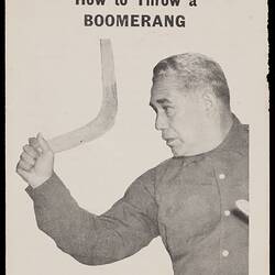 Black and  white leaflet depicting man holding boomerang.