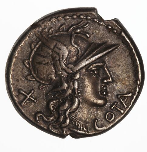 Round coin, aged, female helmeted profile, facing right.