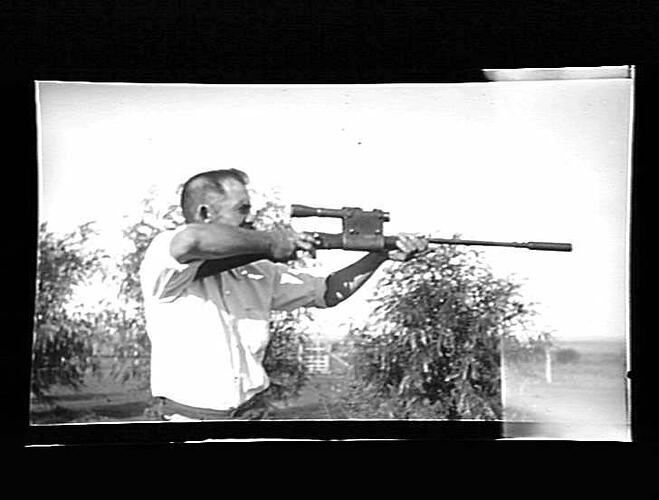 Negative - Man with Rifle