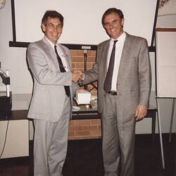 Photograph - Kodak Australasia Pty Ltd, Shane Allan & Ron Gordon at Presentation of 25 Year Service Watch, Coburg, 1990