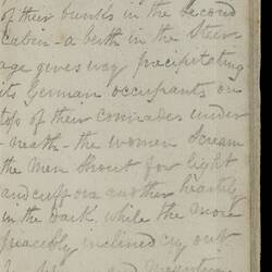 Open diary with handwritten text on discoloured worn page.
