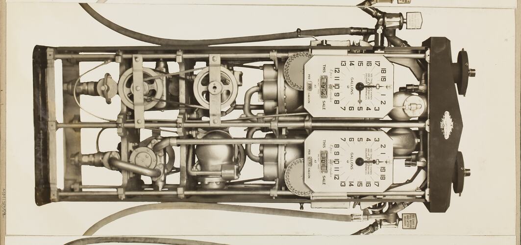 Monochrome photograph of a computerised petrol pump.