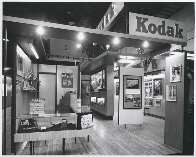 Photographic exhibition stand with service counter.