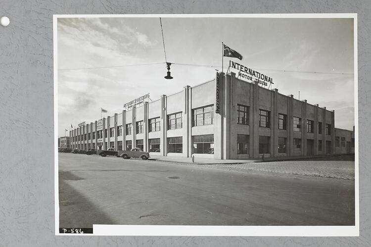 Monochrome photograph of a workshop.