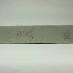 Rectangular metal box. Side view.