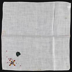 Unfolded handkerchief with Embroidered Flower.