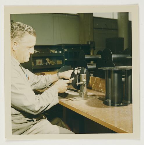 Slide 207, 'Extra Prints of Coburg Lecture', Worker With Aerial Film Spools, Kodak Factory, Coburg, circa 1960s