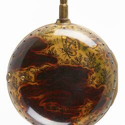 Pocket watch within gilt and tortoise shell case.