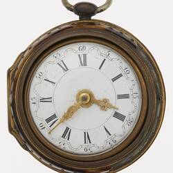 Pocket watch, white dial with Roman and Arabic numerals separated by scalloped circle. Ornate gilt hands.