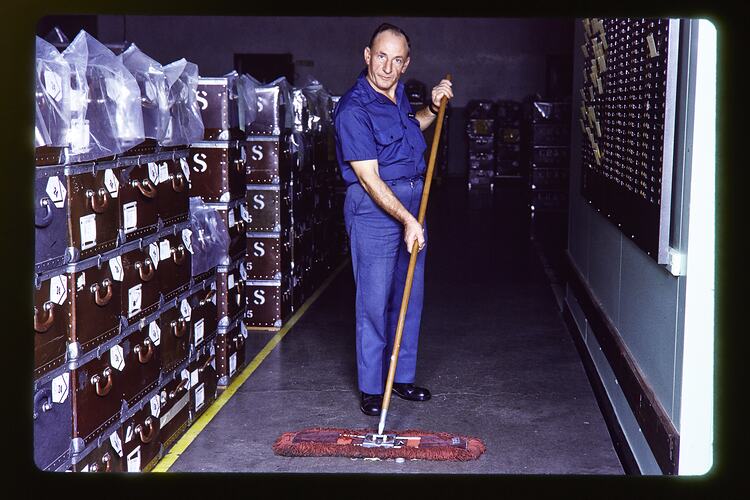 Kodak Australasia Pty Ltd, Man Sweeping Store Room, Building 15, Camera, Reels & Sundries, Coburg, circa 1980s