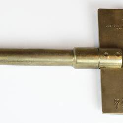 Brass metal key.