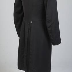 Gentleman's black cotton frock coat, back view.