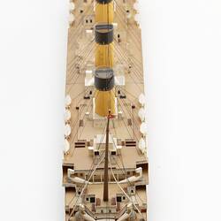 Cardboard model of passenger steamship with four funnels. View from above.