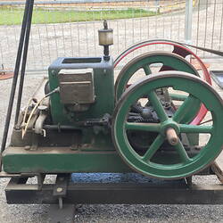 Close up of engine mounted on trolley frame.