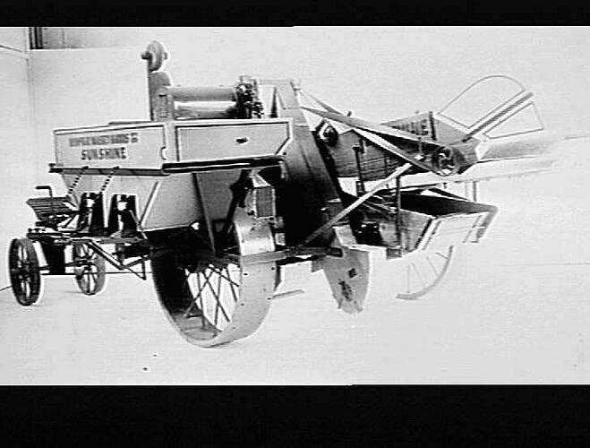ENGINE-FUNCTIONED H.S.T. HEADER WITH 23 BUSHELL GRAIN BOX: MAY 1936