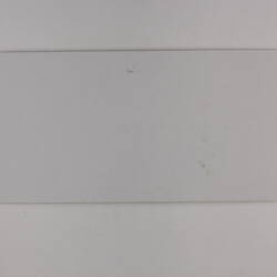 Rectangular white cardboard.