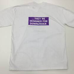 White t-shirt with purple text.