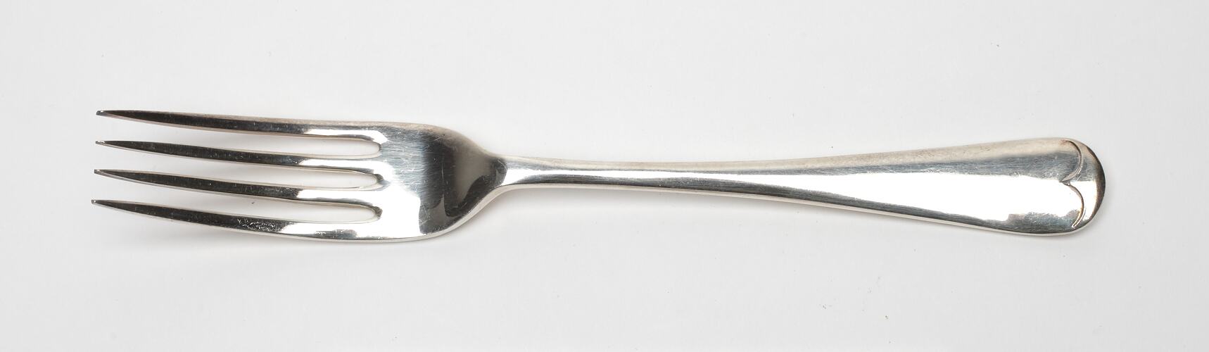 Silver table fork.