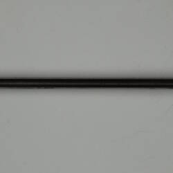 Long metal piece.