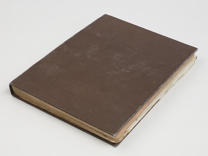 Brown cloth bound book.